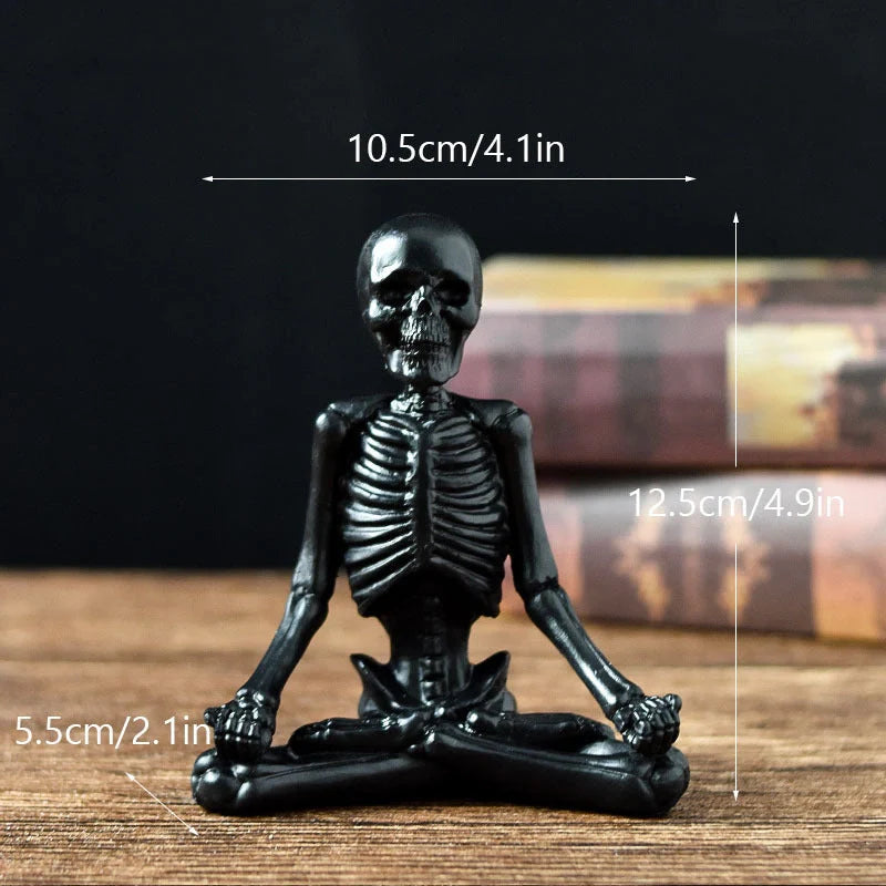 Spooky skeleton desktop decorations featuring intricate resin skulls and skeletons in vintage white and ominous black color options