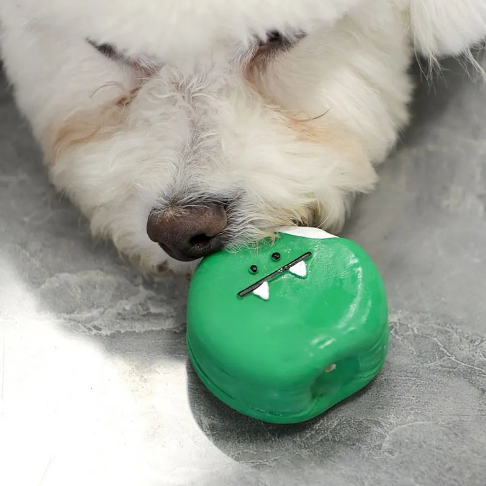 Green and yellow cartoon egg bread shaped latex dog chew toy with squeaker.