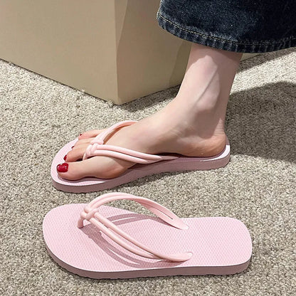 PVC injection moulded flip flops in toe-covering casual style with non-slip sole