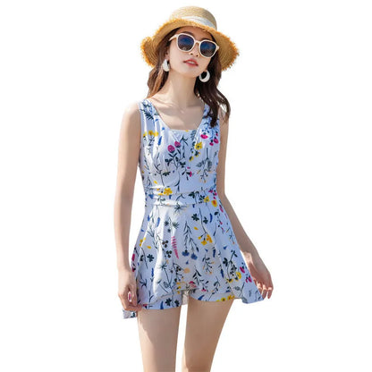 Light purple floral printed one-piece swimsuit for women on a hanger