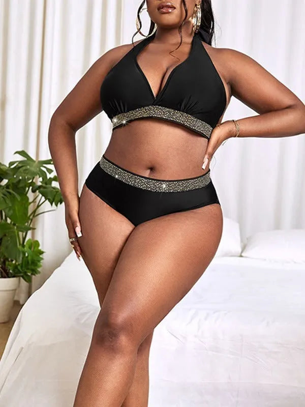 Black plus size women's bikini set on a mannequin, showing the bra and shorts.