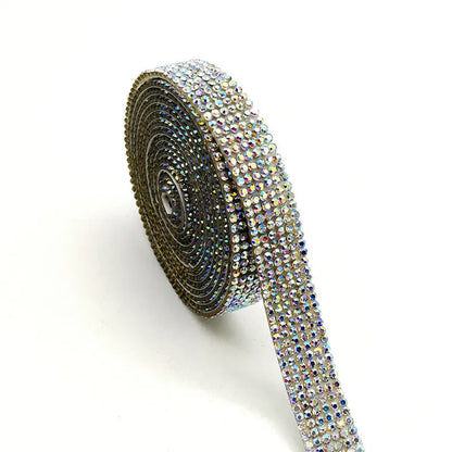 Long strip of electroplated glass water drill for fabric repair in white and iridescent AB colour, showing three width options.