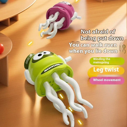 Green wind-up octopus toy dancing on surface with clockwork mechanism visible