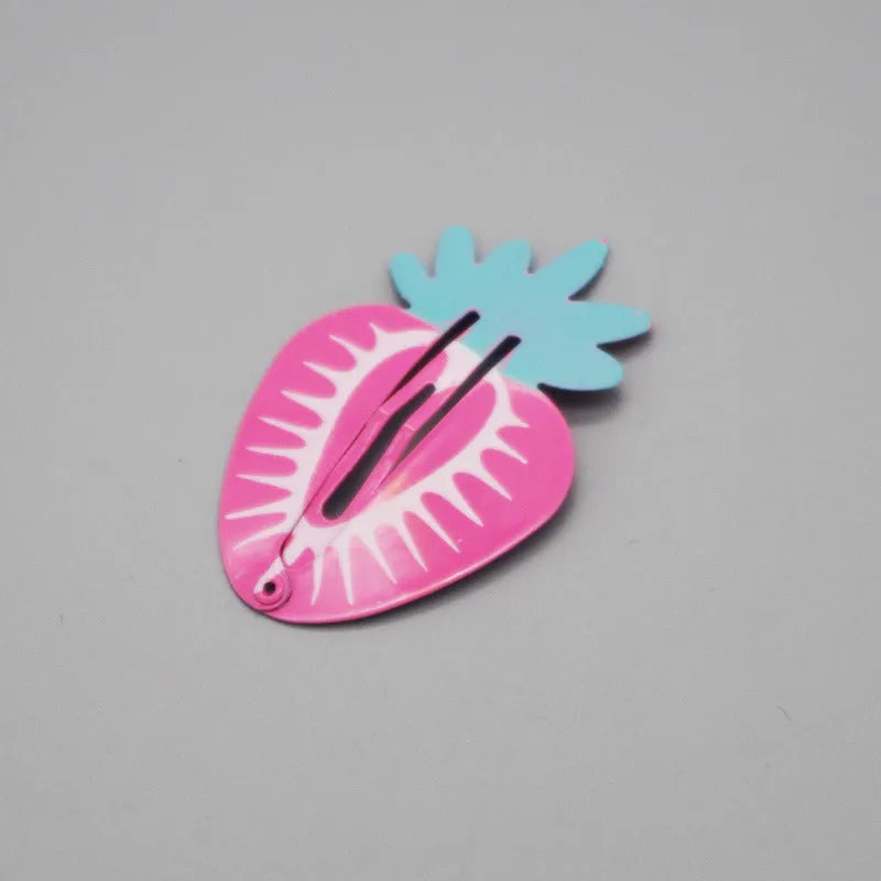 Colourful metal hair barrettes for children with printed watermelon, strawberry, pineapple and Christmas designs.