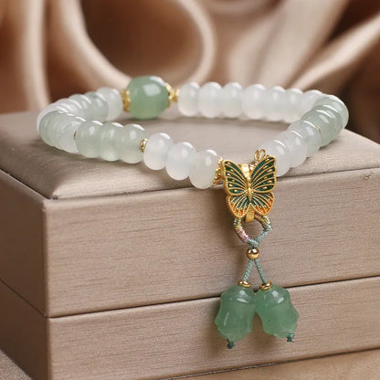 Green Tian Shan Cui jade abacus beads bracelet with retro butterfly tassel and crystal decoration