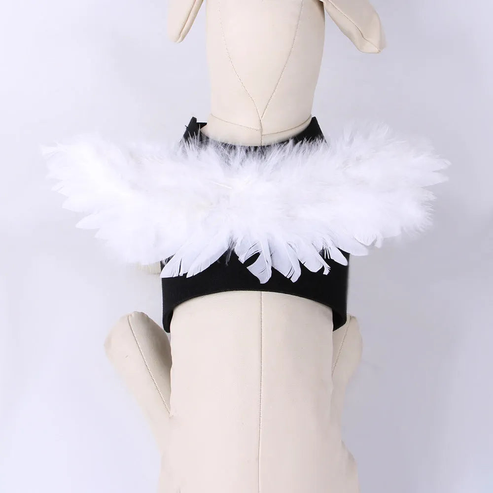 Black and white angel wings costume for dog or cat, made of felt fabric.
