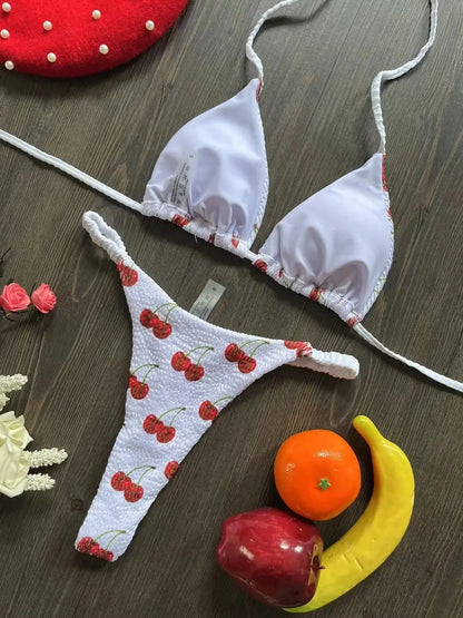 Women's printed bikini swimsuit with briefs style and cotton lining on a mannequin.