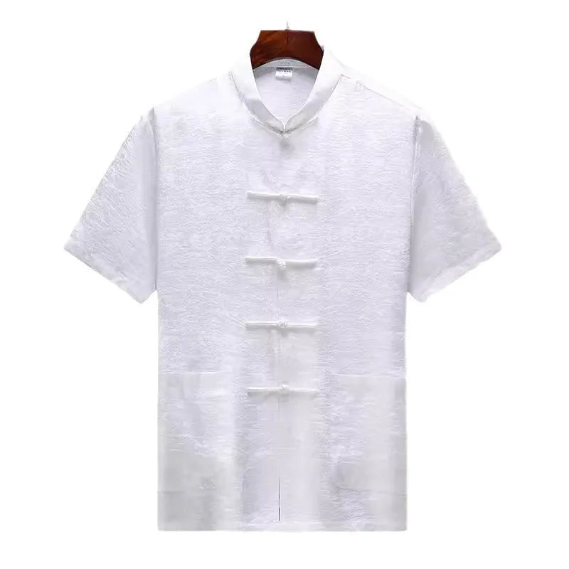 Traditional light green mulberry silk Tang suit for men on a hanger.