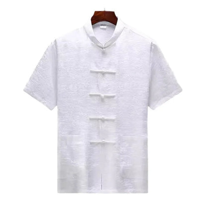 Traditional light green mulberry silk Tang suit for men on a hanger.