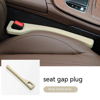 Flexible polyurethane car seat gap filler strip in selected colour next to car keys and phone.