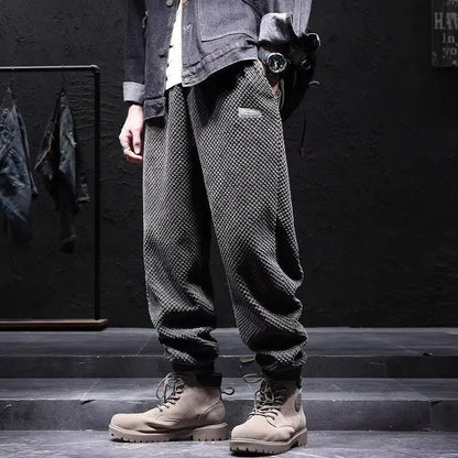 Men's grey casual sweatpants with ankle-tie design and straight leg cut