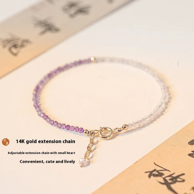 Women's crystal bracelet with 2mm rattan threading in purple geometry cut style featuring cutting surface ball type and cutting surface crystal beads for jewellery making, gifting or personal wear.