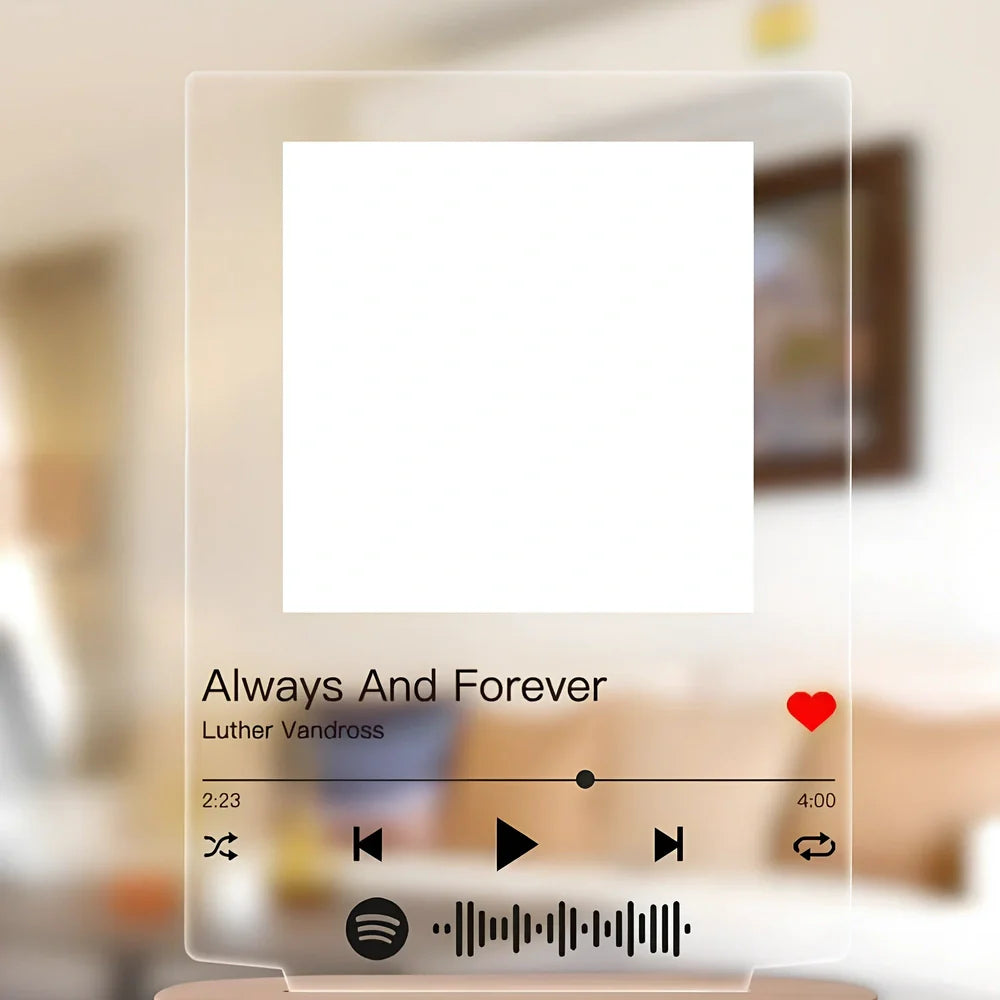 Customisable photo night light with 22x15cm acrylic panel showing engraved song lyrics beside personal photograph