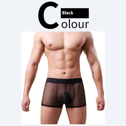 Men's thin solid colour boxer shorts in black, laid flat to show knit texture and seamless design