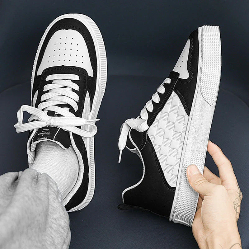 Stylish plaid lace-up sneakers with breathable mesh lining and durable rubber sole for casual comfort and versatile style.