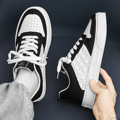 Stylish plaid lace-up sneakers with breathable mesh lining and durable rubber sole for casual comfort and versatile style.