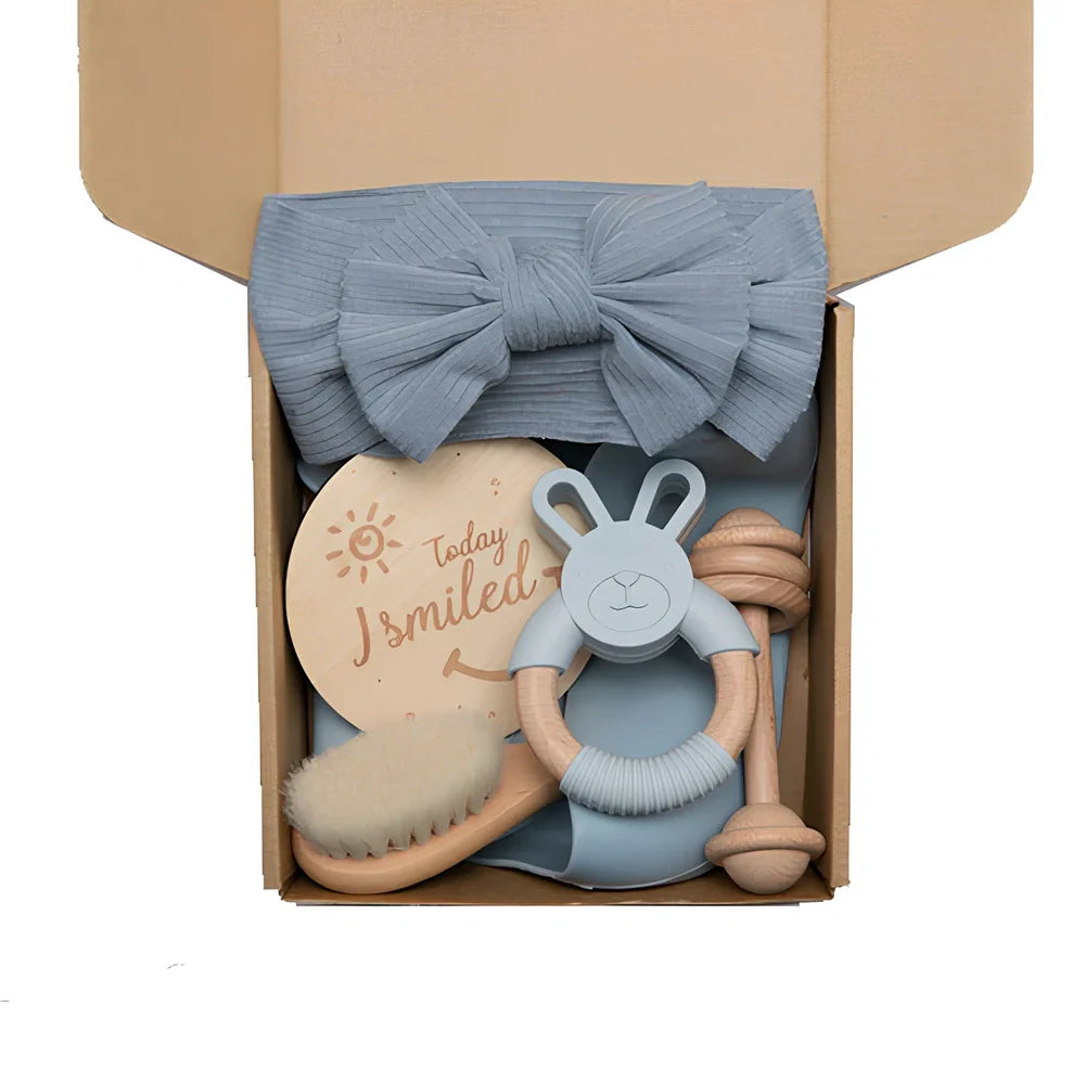 Six wooden animal bath toys floating in water with blue, brown and peach colour options