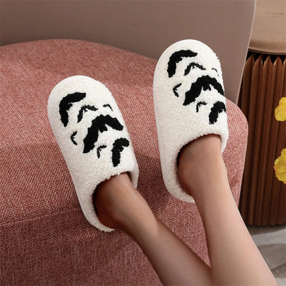 Halloween bat design plush slippers for indoor wear, available in white and black
