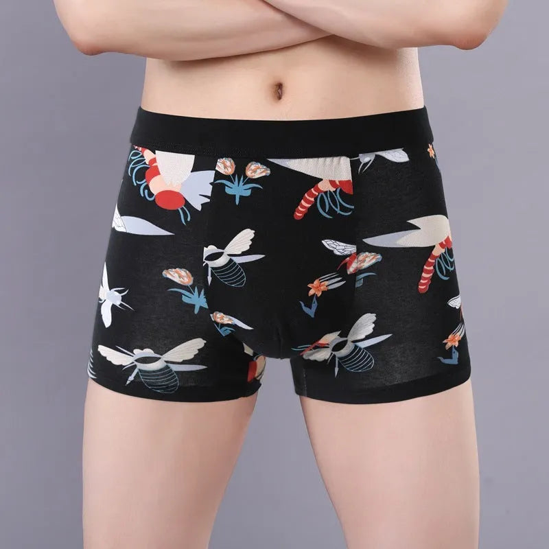Men's cotton boxer briefs on a size chart showing weights for 3XL to 10XL, in floral colour options.