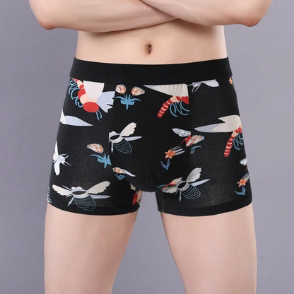 Men's cotton boxer briefs on a size chart showing weights for 3XL to 10XL, in floral colour options.