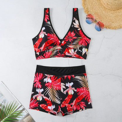 Women's two-piece printed swimsuit set with boxer-style briefs and sleeveless top in multi-colour pattern