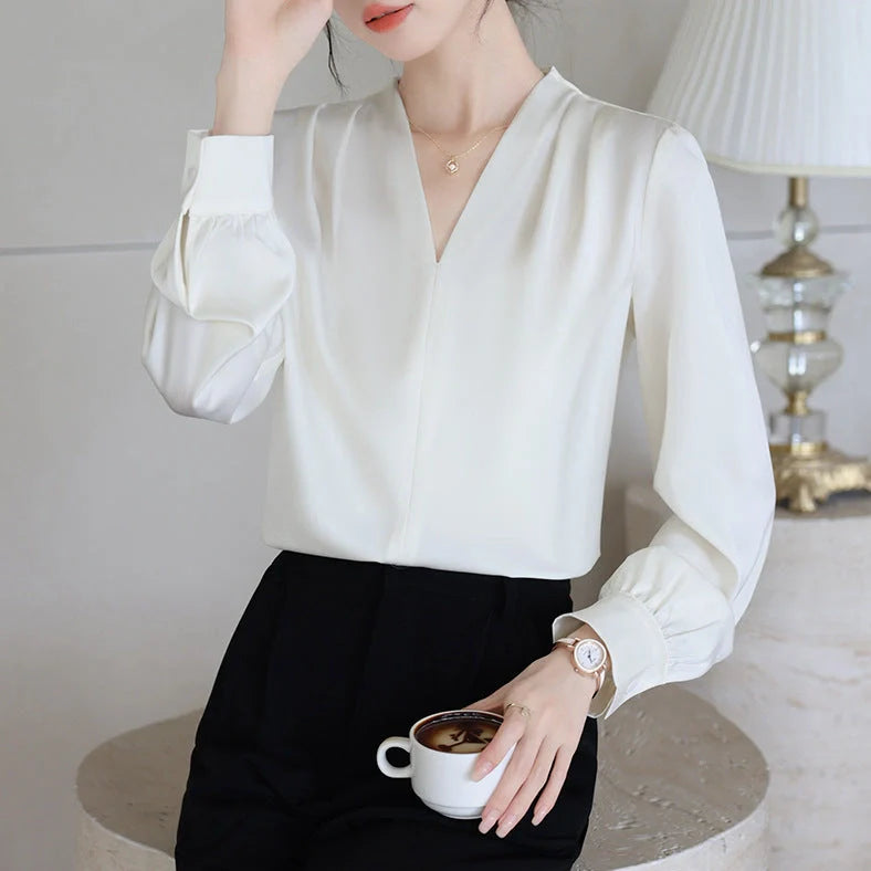 Women's blue long sleeve shirt with slim fit design and 3D stitching construction detail