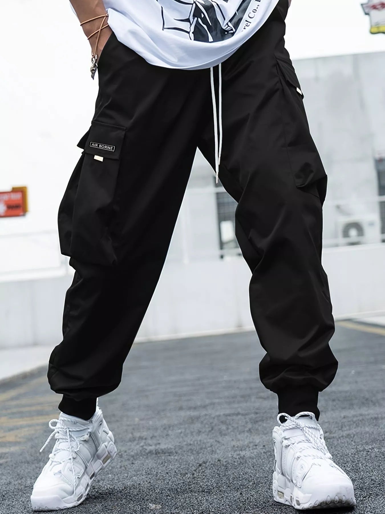 Men's oversized cargo pants in various colors with multiple pockets