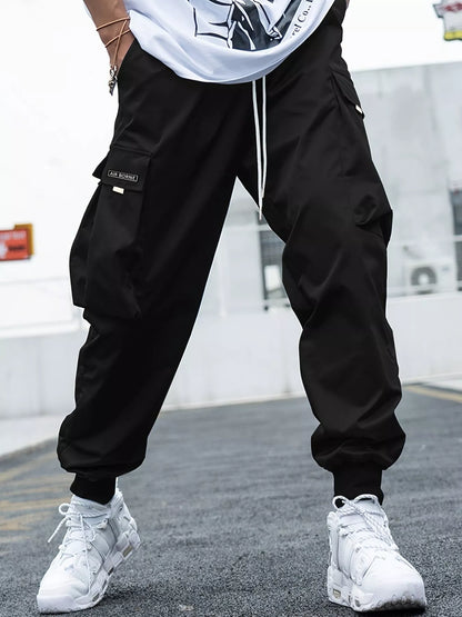 Men's oversized cargo pants in various colors with multiple pockets