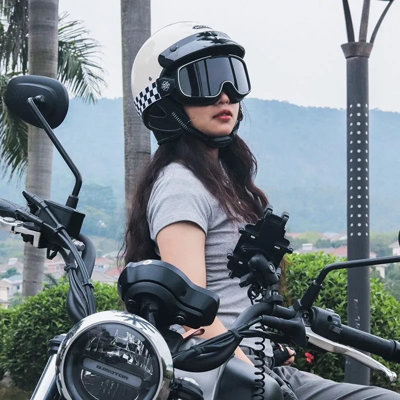 Retro full-face motorcycle helmet on a plain background, shown in cement grey colour.