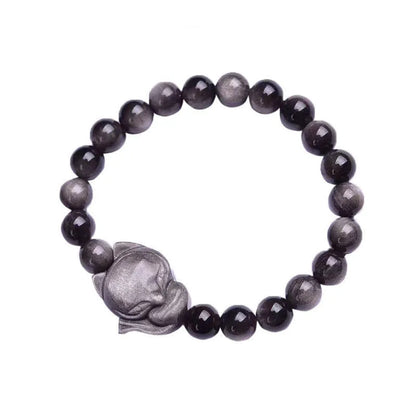 Obsidian fox bracelet with 8mm polished black stone bead and sterling silver fox charm on a bracelet chain.