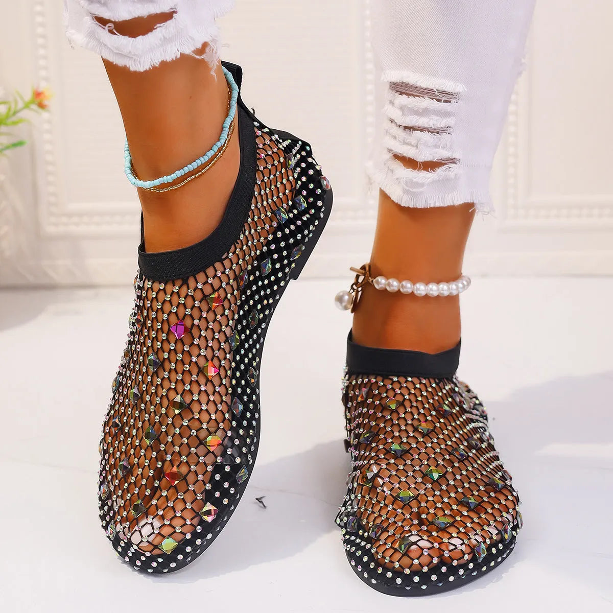 Women's flat sandals with mesh upper, colourful rhinestones, and rubber sole in sizes 35-43