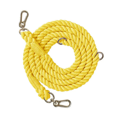 Woven rainbow pattern dog leash with double grip handles and a metal clasp.