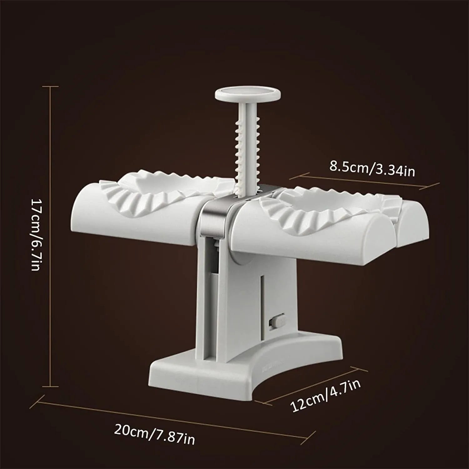 White double-head manual dumpling maker press on a kitchen counter