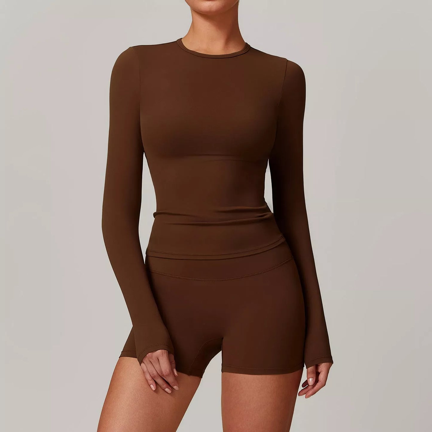 Women's slim long sleeve pullover top for yoga and fitness in various colors