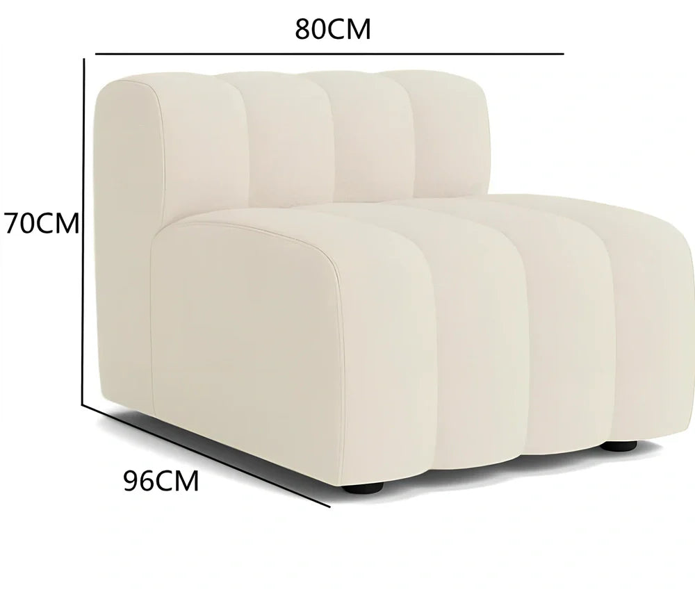 Off-white curved modular sofa with fleece fabric in corner configuration showing multiple connected pieces
