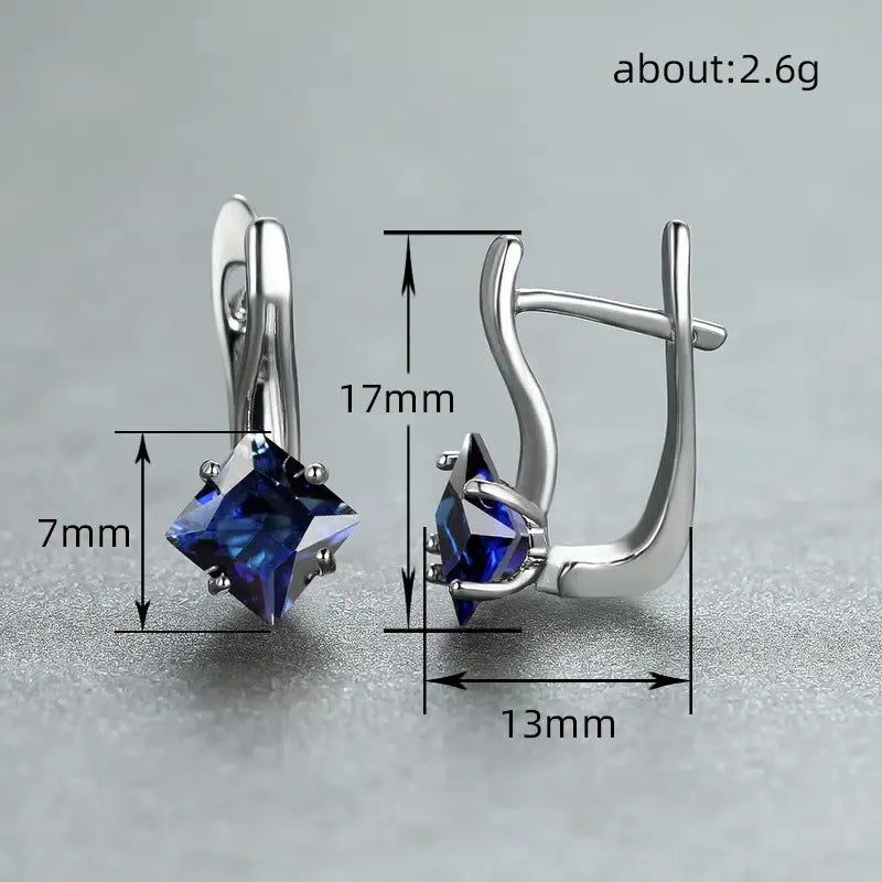 Diamond design earrings with inlaid zircon stones in copper, showing light luxury style for women in blue, green, and colour options.