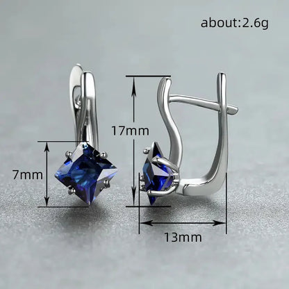 Diamond design earrings with inlaid zircon stones in copper, showing light luxury style for women in blue, green, and colour options.