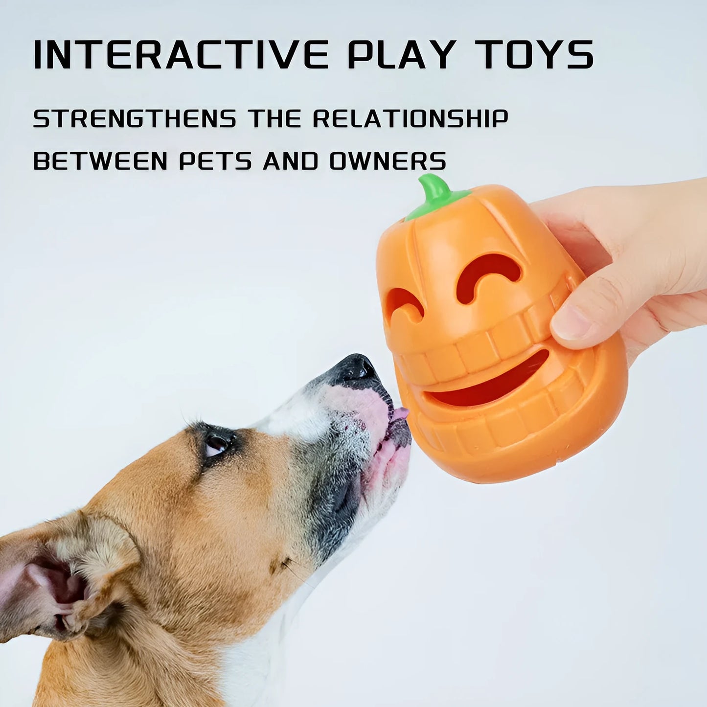 Halloween pumpkin-shaped dog chew toy with treat-dispensing funnel, made from orange thermoplastic rubber