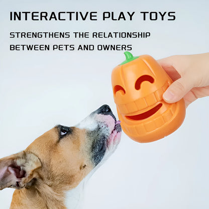 Halloween pumpkin-shaped dog chew toy with treat-dispensing funnel, made from orange thermoplastic rubber