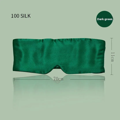 Mulberry silk sleep eye mask in champagne gold colour showing contoured design and adjustable strap