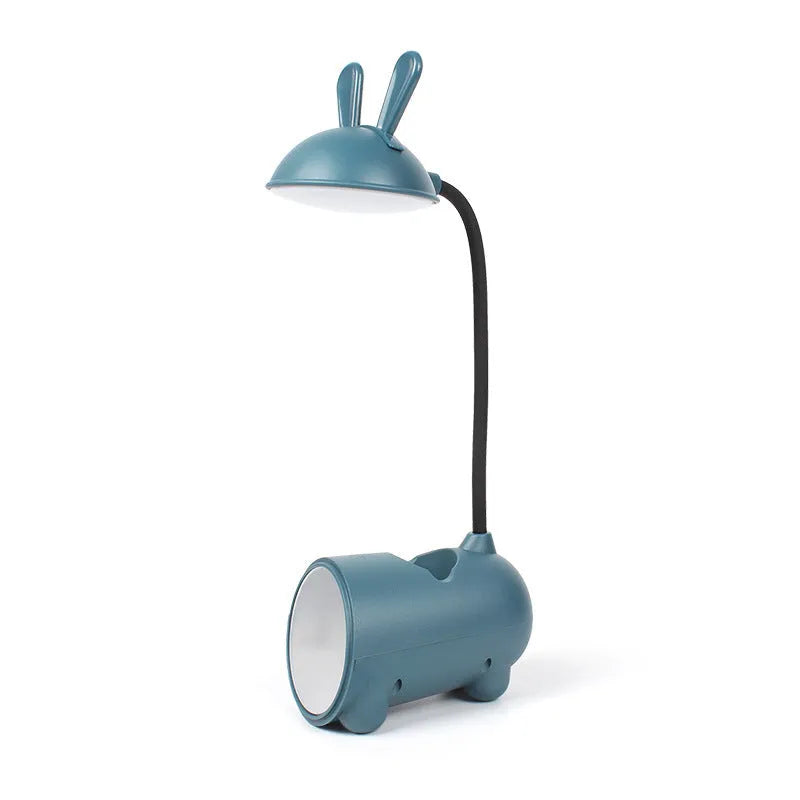 Modern green plastic USB table lamp with a long built-in pen holder on a wooden desk.