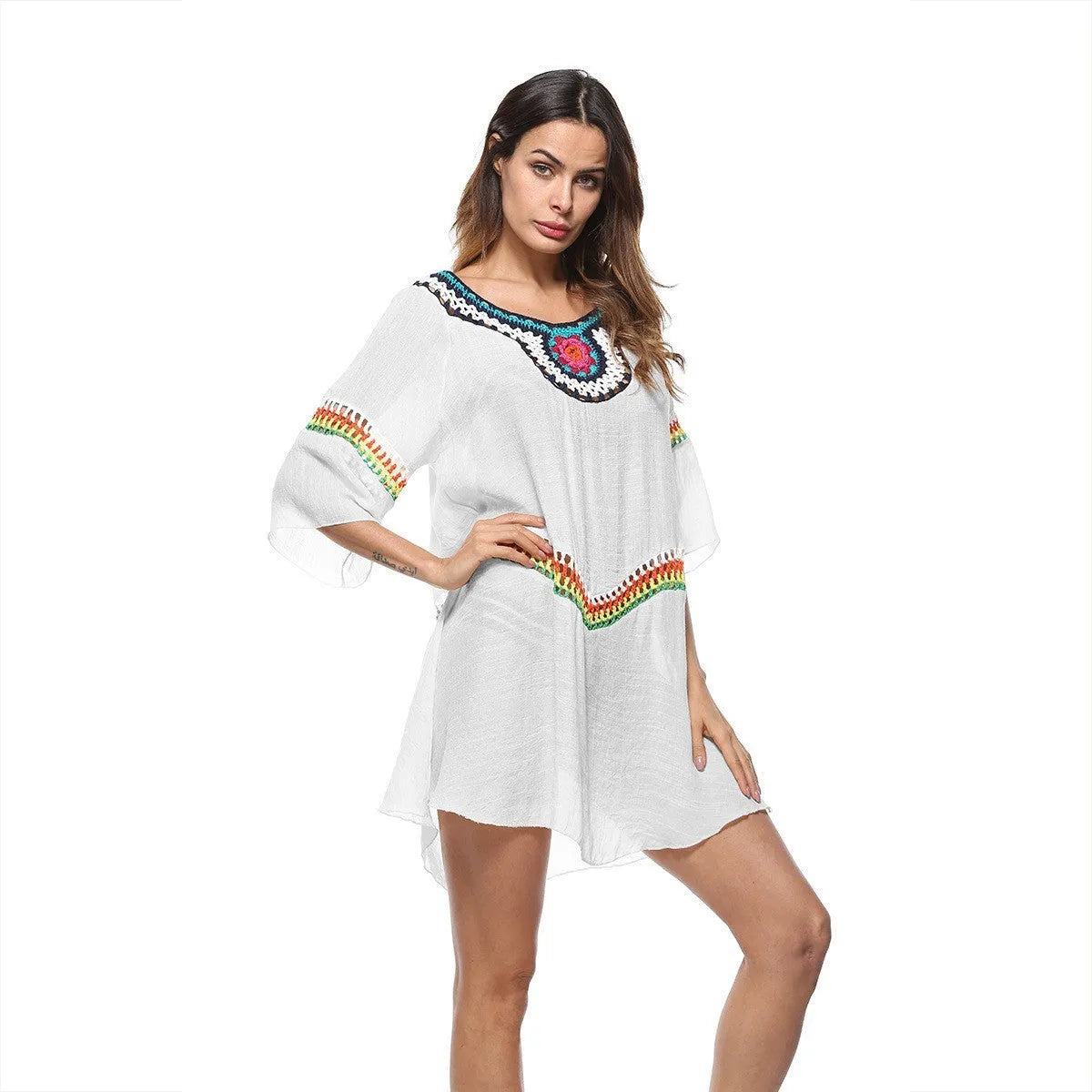 Women's crocheted ethnic style beach cover-up top in apricot colour, for sun protection.