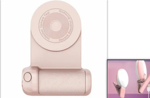 Black magnetic phone camera grip holder with rotatable stand on a table next to a smartphone.
