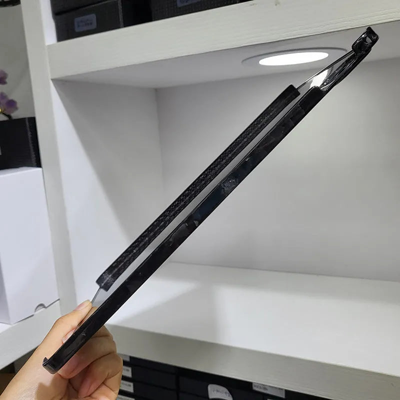 Carbon fibre protective cover for iPad Pro 11 showing 3K matte fine hole texture and embossed plaid pattern