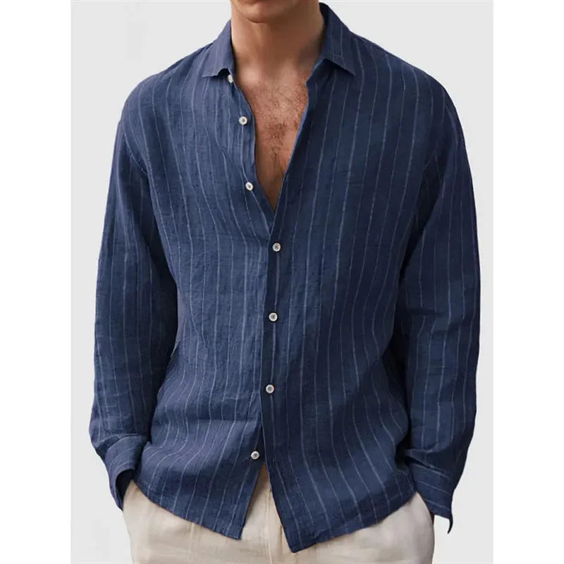Man wearing a loose striped cardigan-style shirt with short sleeves.