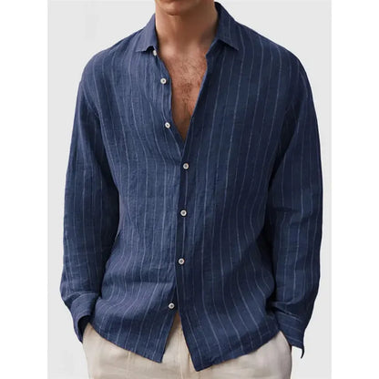 Man wearing a loose striped cardigan-style shirt with short sleeves.