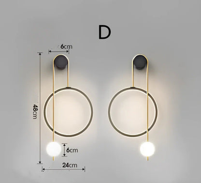 Nordic wall lamp with black gold finish and LED lighting, mounted beside bed with dimming controls