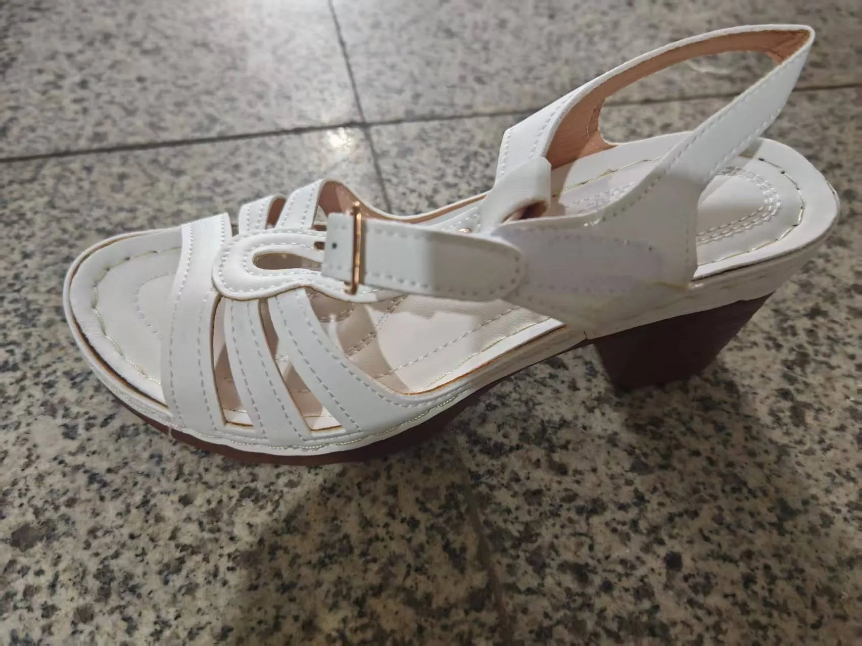Women's black peep toe wedge platform sandals showing fish mouth toe design and ankle buckle strap
