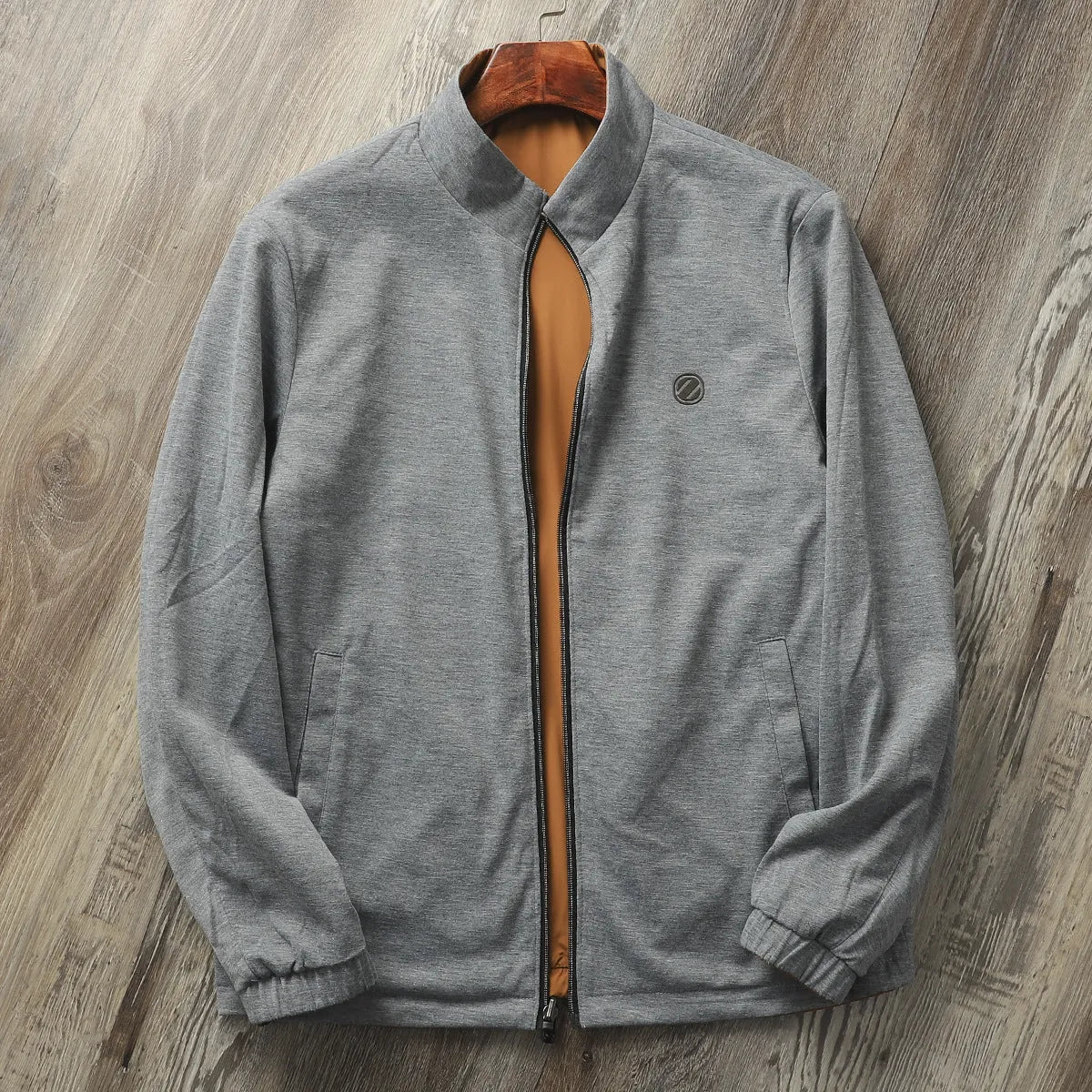 Men's simple stand collar casual jacket in army green, shown on a model.