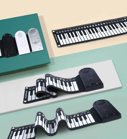 49-key folding electronic keyboard in gloss black with built-in speaker, unfolded to show silicone rubber keys and ABS plastic control panel